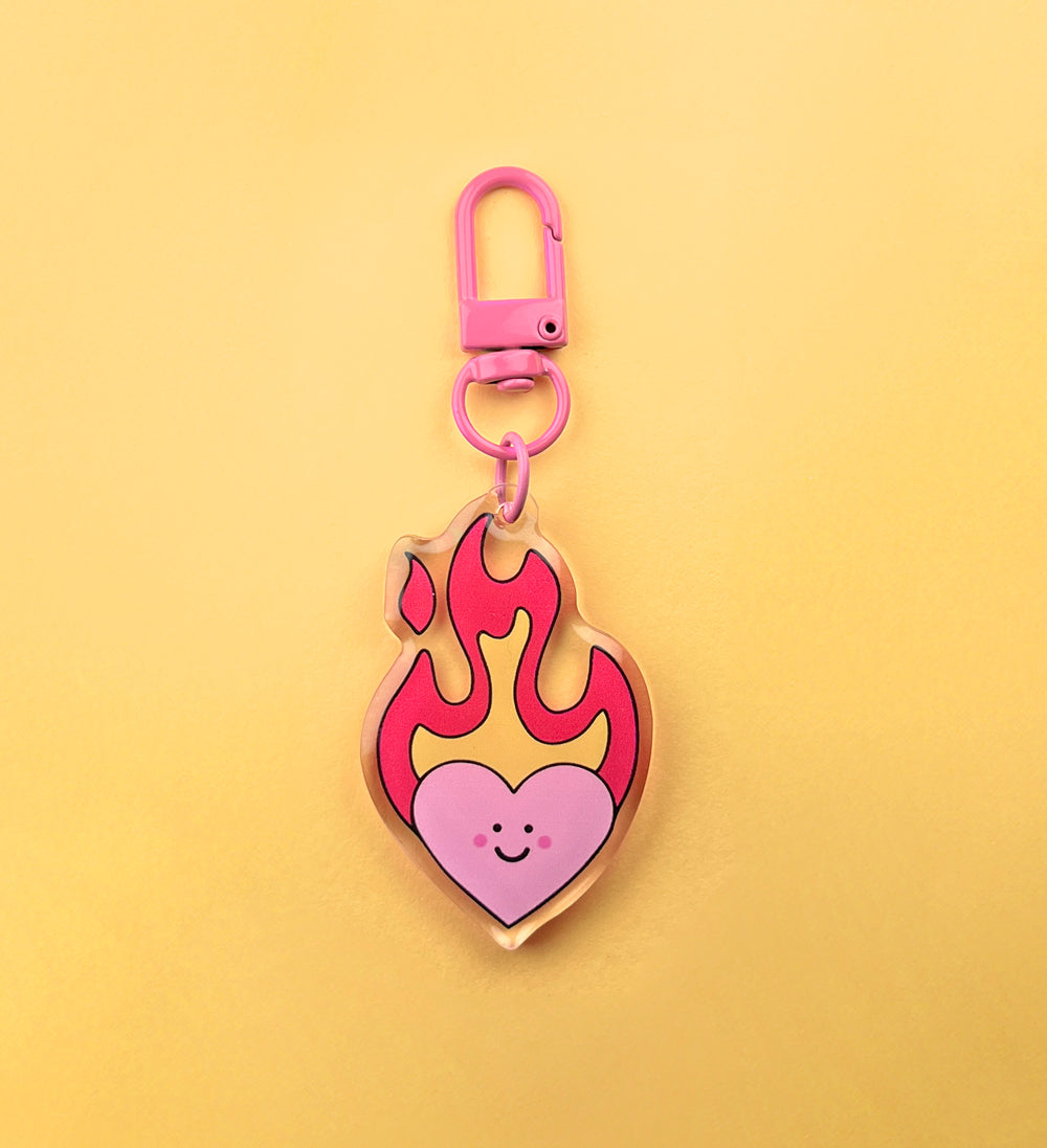 Porte clé en résine époxy, coeur enflammé avec un visage, mignon, et parfait pour un cadeau à l'être aimé, pour la saint Valentin ou pour offrir à un proche