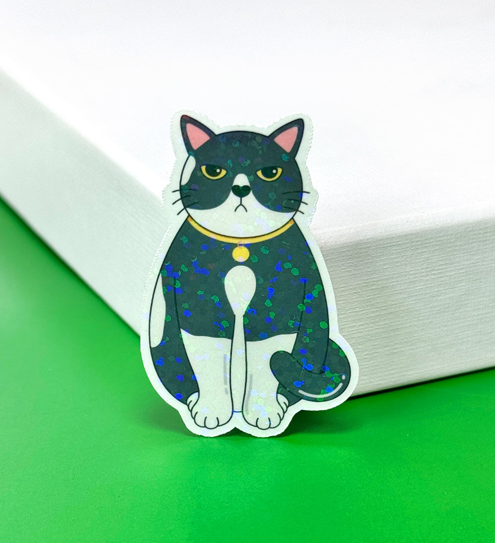 Sticker chat grincheux