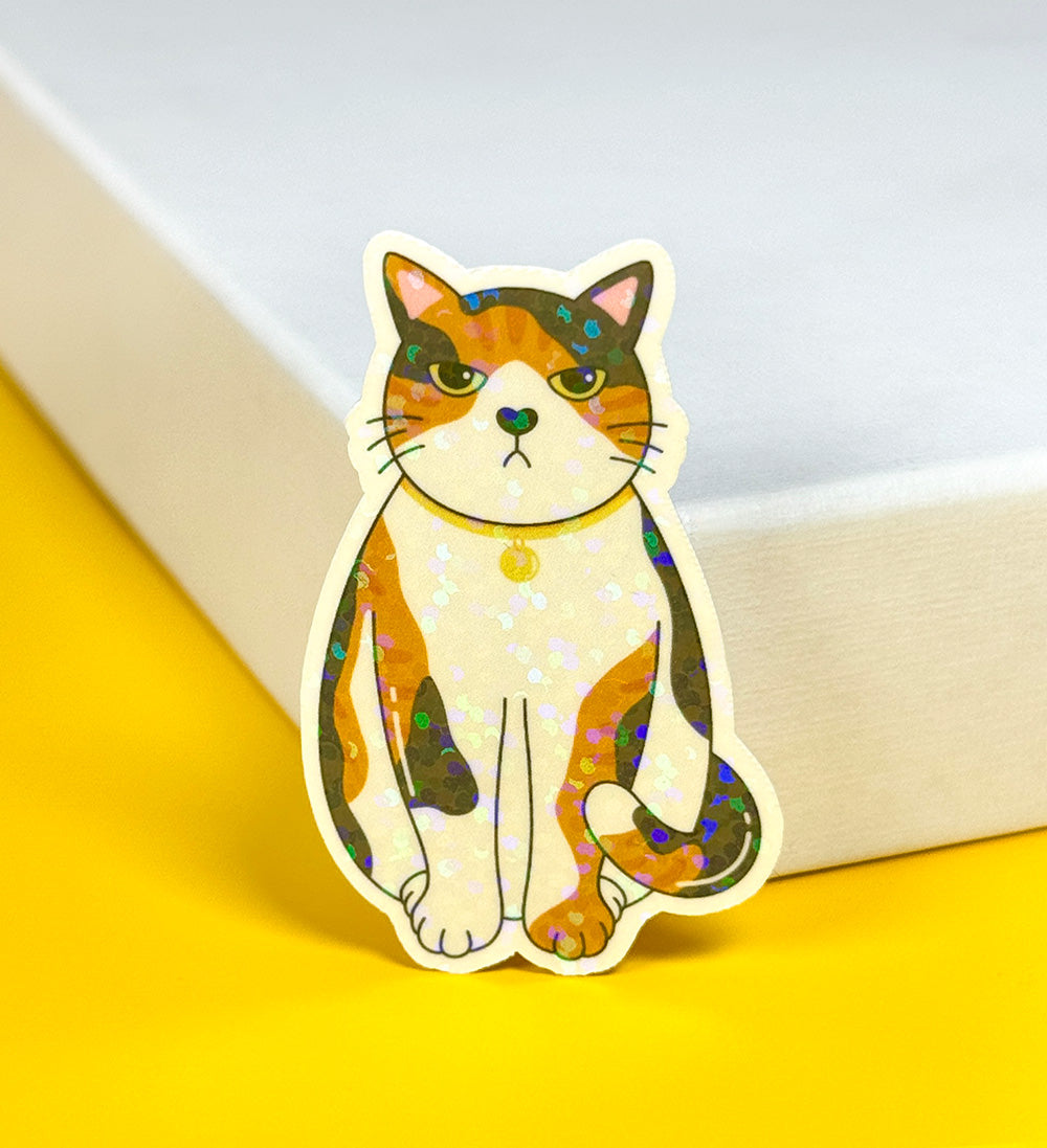 Sticker chat grincheux