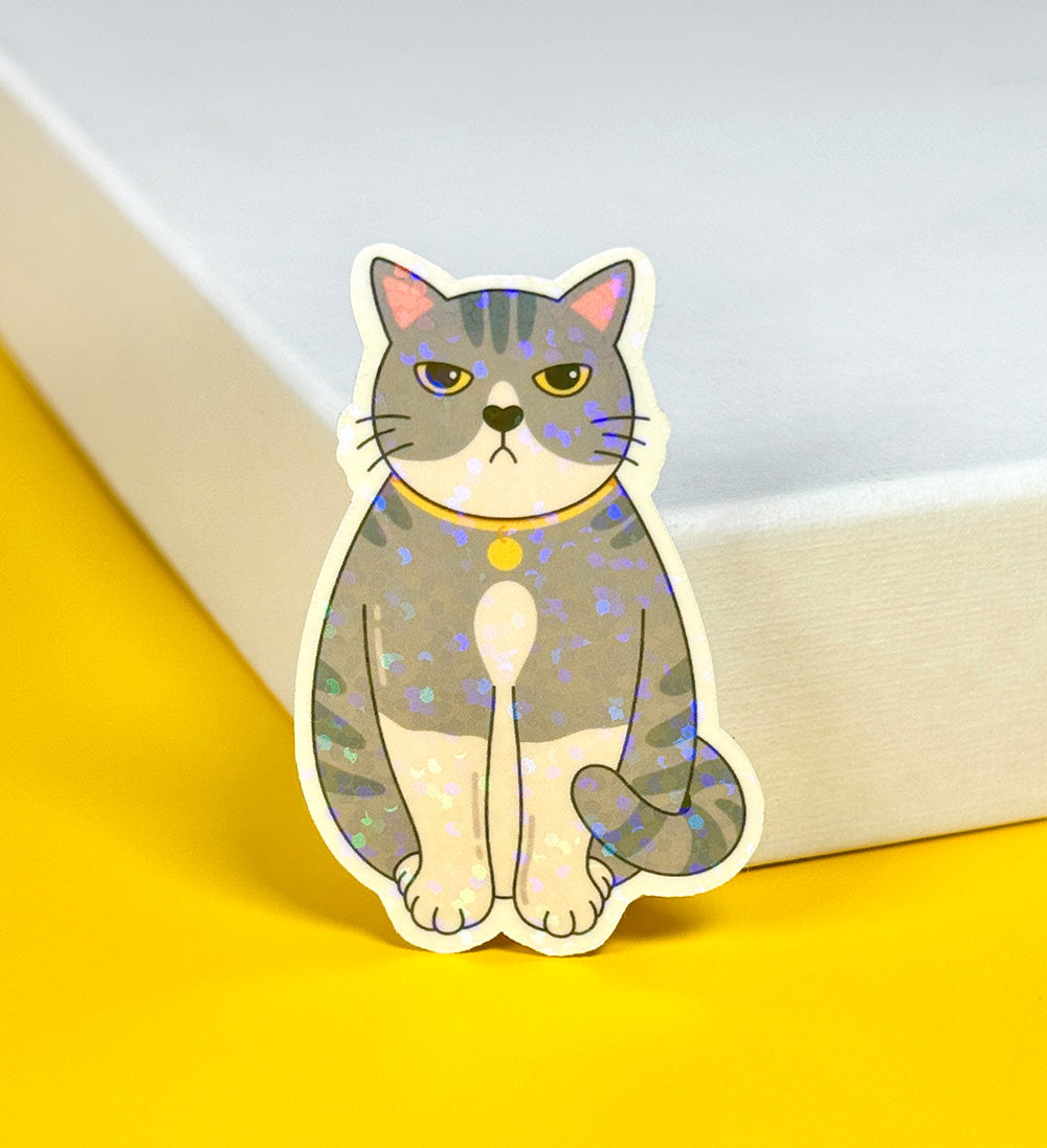 Sticker chat grincheux